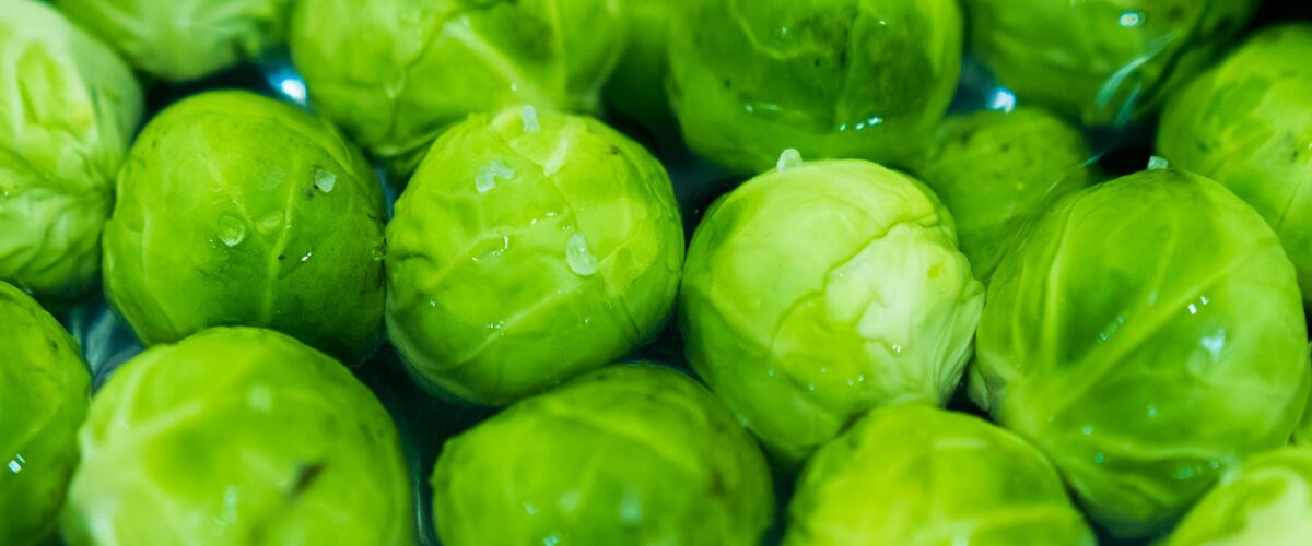 A pile of fresh Brussels sprouts
